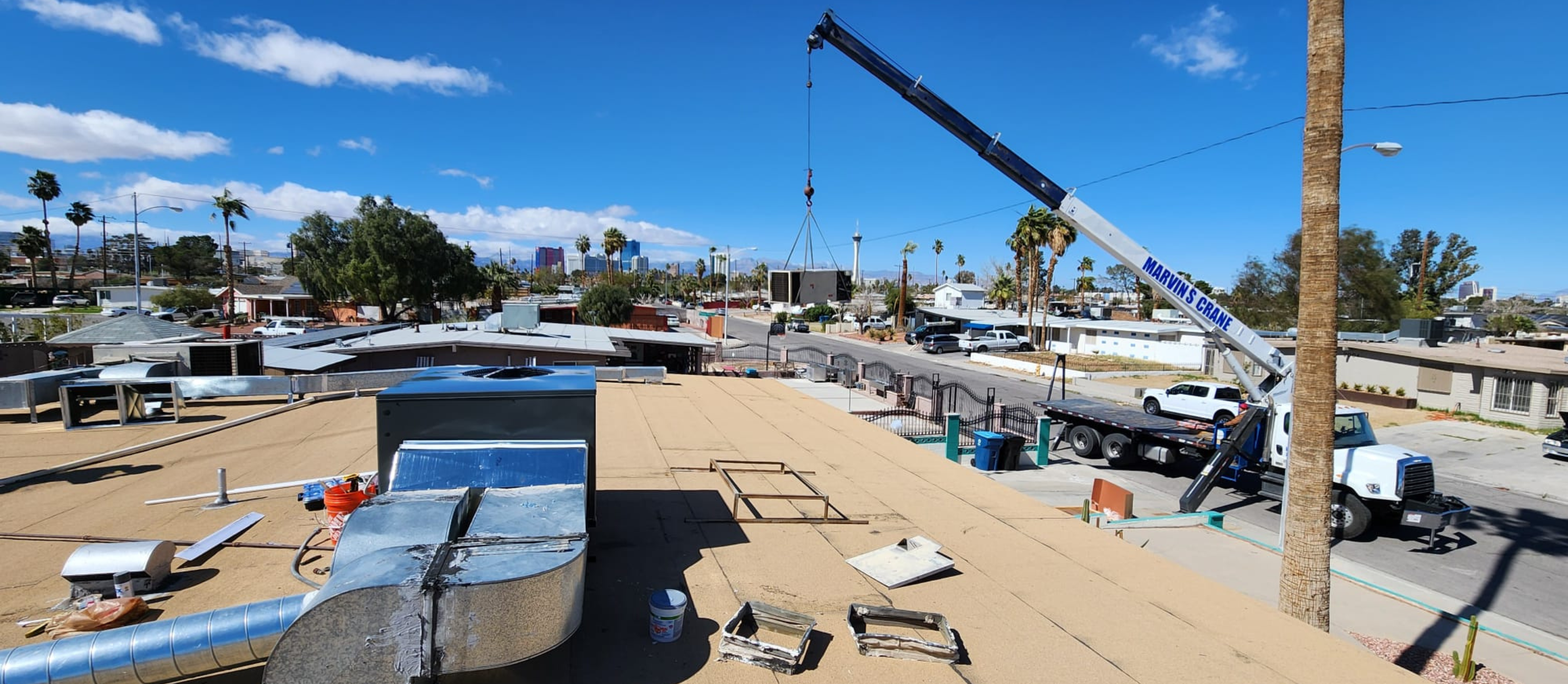 Rocket Air Conditioning technician servicing an older Las Vegas AC system